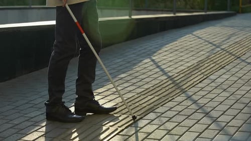 Blind Male Finding Tactile Paving With White Cane, Safely Walking Alone Outdoors