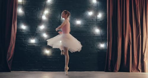 Young Ballerina Performing Elegant Ballet Dance Moves