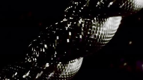 Abstract Rotating Metallic Twist with Shimmering Geometric Facets