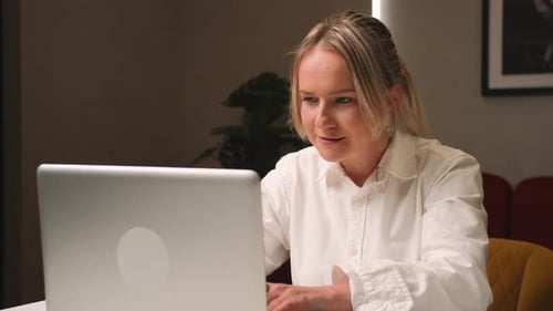 Woman Work on a Laptop Typing Messages on a Laptop Girl Student Teaching Lessons at Home or Office