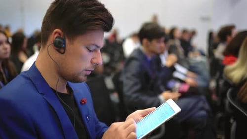 Student Crowded Audience Typing Tablet Text Lecture College. Man Use Touch Pad