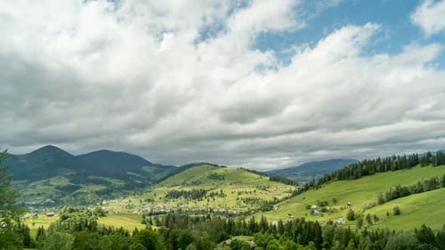 Mountain peaks and cloudy sky. Timelapse.