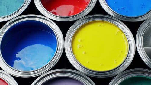 Opened Metal Can with Colors Paint Top View