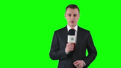 Man Reporting with Microphone on Green Screen