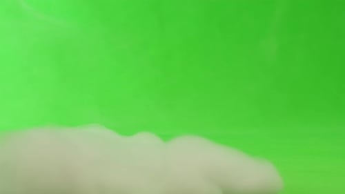 Rauch auf grünem Chroma-Key-Hintergrund