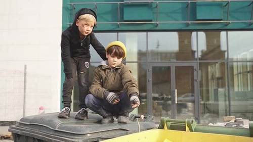 Street Boys Looking Something Spending Life Outdoors Outcast Boy Pointing Finger Side