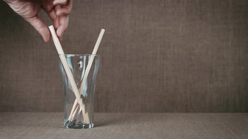 Paper Straws Removed from Glass Cup