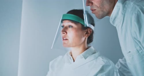 Scientists Work Together in a Modern Lab