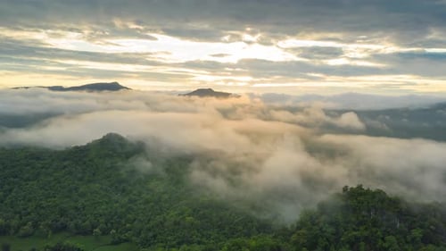 Tropical Rainforest Mountains with Morning Mist and Clouds