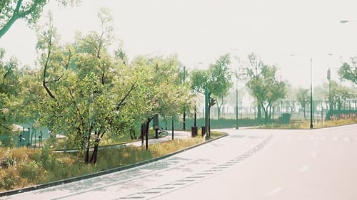 Empty Asphalt Road and Beautiful View of Cityscape on Sunny Day