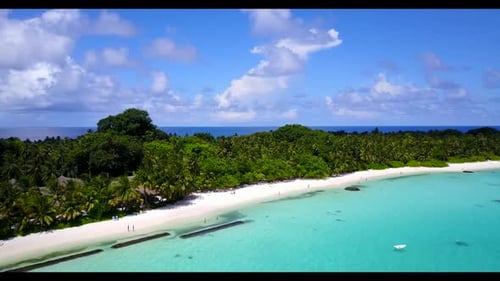 Aerial top down nature of idyllic lagoon beach lifestyle by blue ocean with white sand background of