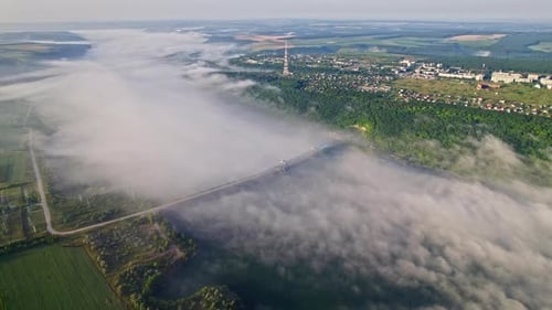 Aerial Drone View on Beautiful River During Early Misty Morning