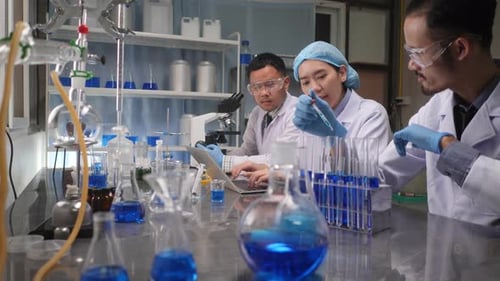 Scientists Conducting Experiment in a Modern Laboratory