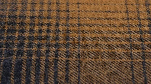 The texture of the cotton fabric in squares. The structure of the fabric. Fashion. Style. Square pat