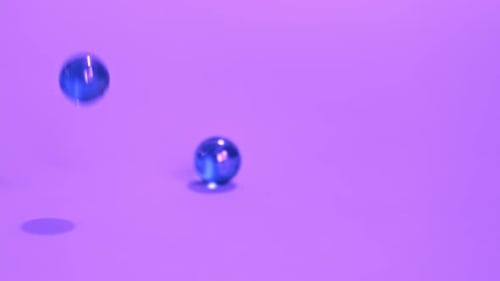 Bouncing Balls Popping and Rolling Onto Around Red Pingpong Plastic Fun Ball Movement