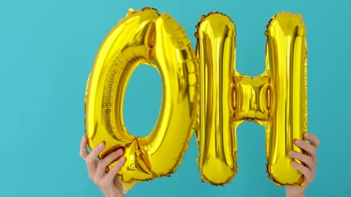 Golden OH Word Made of Inflatable Balloons