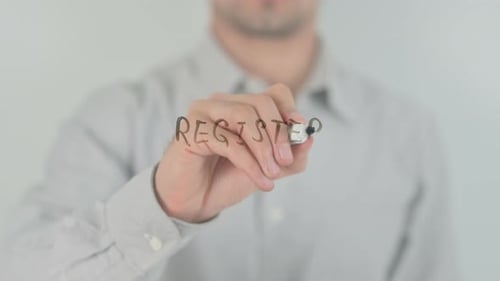 Man Writes 'Register' on Transparent Surface