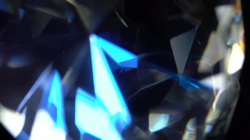 Glimmering Diamond Refracts Light in a Close Up Shot