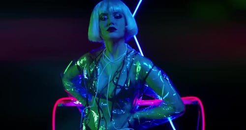 Woman Modeling in Neon Lighting