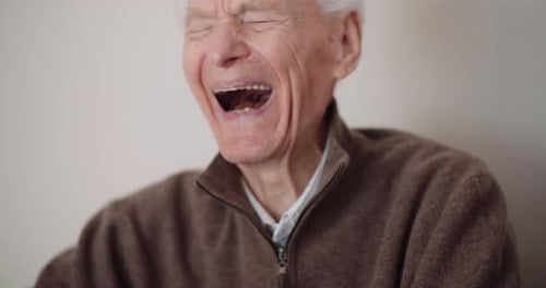 Positive Old Man Smiling and Laughing