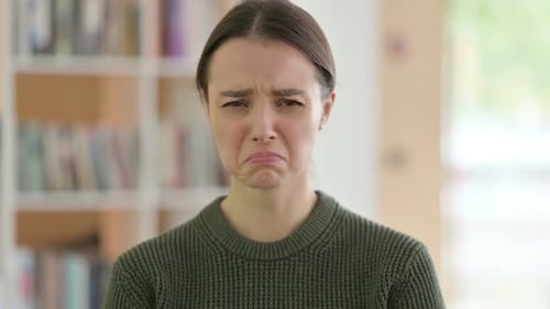 Upset Woman Cries Tears in a Close Up