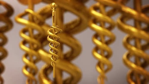 Rotating Golden Caduceus Symbol for Medical Backgrounds