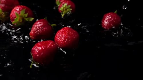The Falling Strawberry in Water