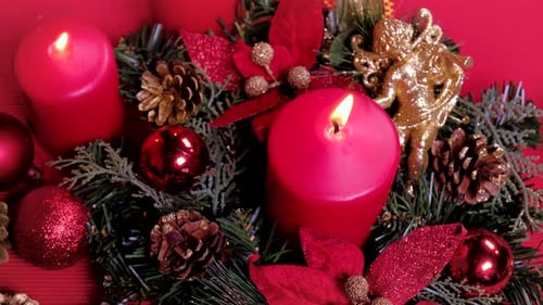 Festive Holiday Decorations with Flickering Red Candles