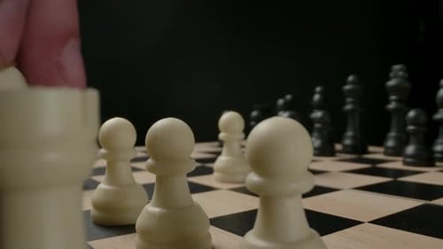 Man's Hand Moving Chess Figure Knight From First Line