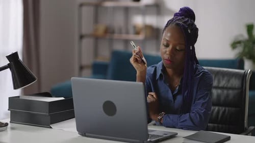 Copywriter or Freelance Journalist Woman is Working in Home Office Sitting at Table with Laptop and