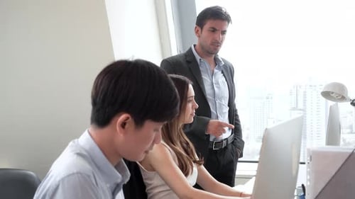 Teamwork in an Office, Discussing Technology