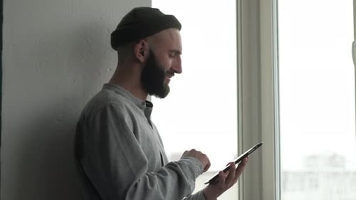 Male Chatting with Friends Use Digital Tablet