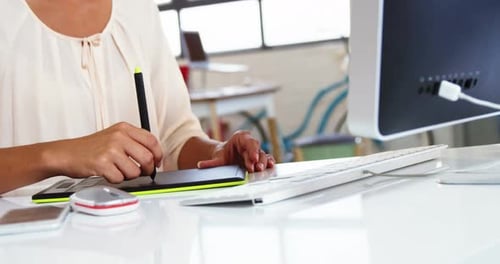 Graphic designer using graphics tablet