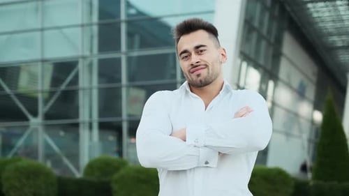 Confident Young Adult Man Smiling Outside