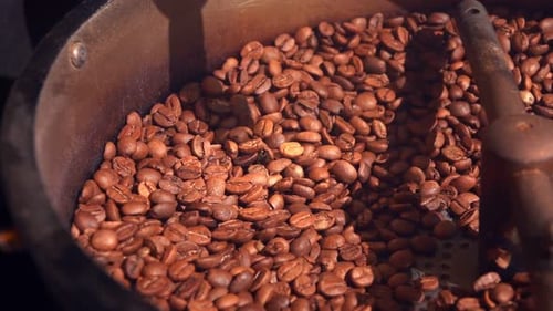 Coffee Beans Roasting in Turning Machine
