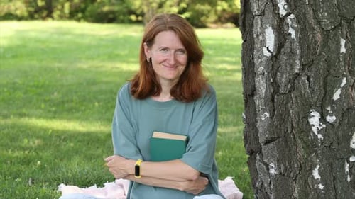 Woman Reading In A Park 5