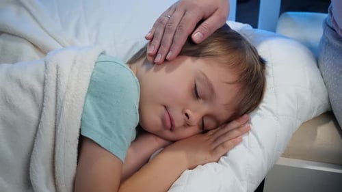 Child Fast Asleep with a Gentle Touch