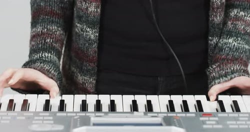 Hands Playing the Keyboard Close Up