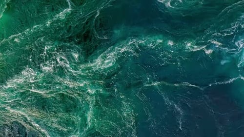 Waves of Water of the River and the Sea Meet Each Other During High Tide and Low Tide