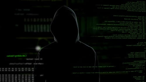 Hacker in Hooded Sweatshirt with Binary Code