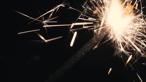 Sparkling Sparkler Burning in Darkness