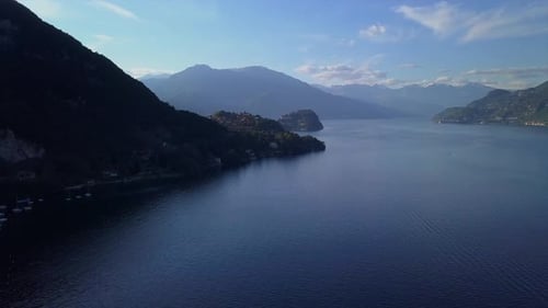 Aerial Flying Over Mountain Lake Como in North of Italy, Lot of Lakeside Villages, Sunny Weather