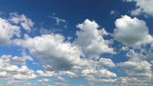 Blue Sky Filled with White Clouds Moving Slowly