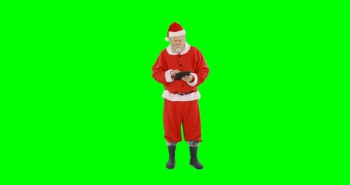 Santa claus using digital tablet 4k