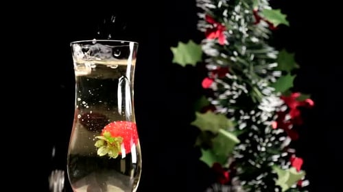 Strawberry Splash into Champagne Glass with Decorations