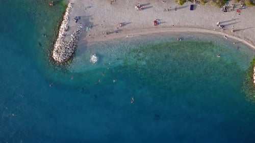 Vertical View of the Sea Coast From Drone at Sunset