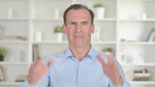 Man with Short Hair Yelling and Raising Hands