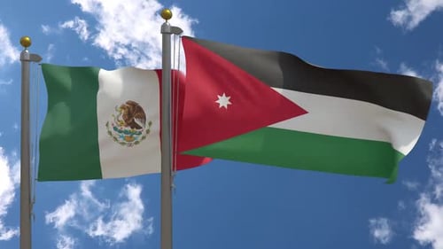 Mexico and Jordan Flags Waving Under Blue Sky
