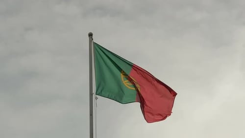 Flag of Portugal Waving Proudly in the Wind