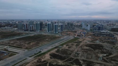 Construction of modern multi-storey buildings. Construction of a new city block.